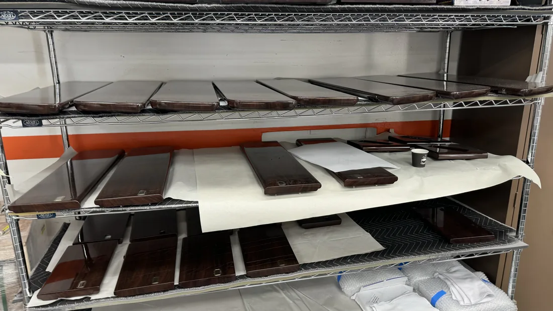 Coated parts curing on the rack