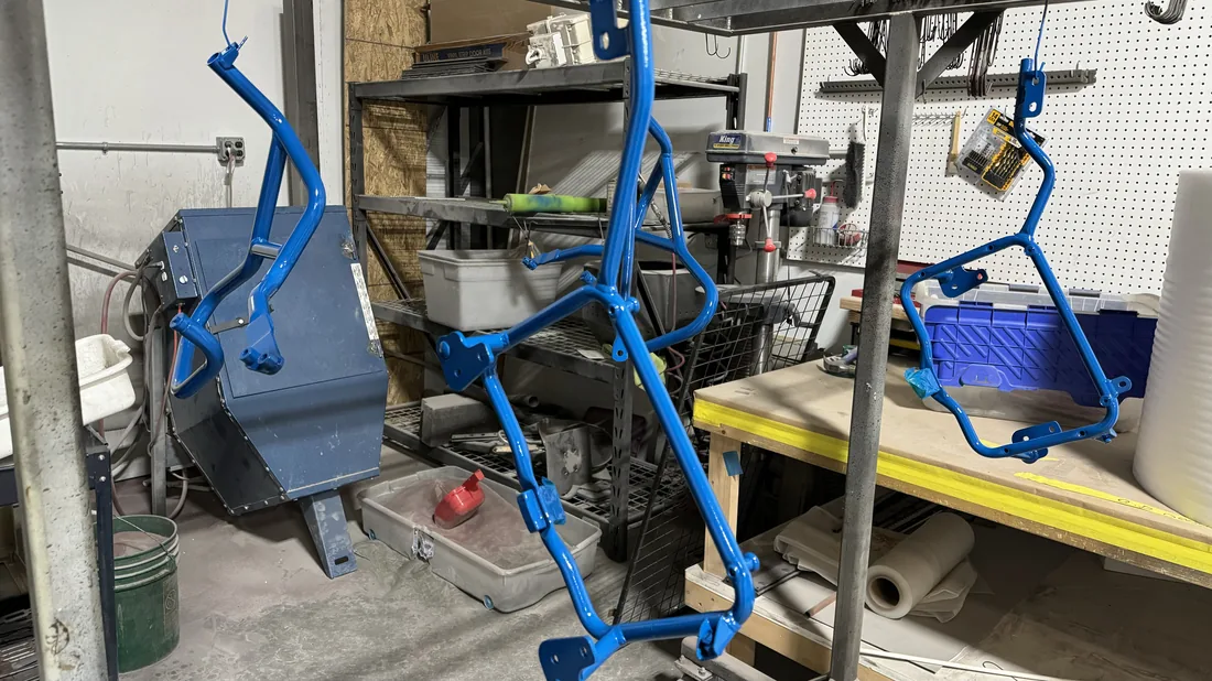 Powder-coated frames on the production floor