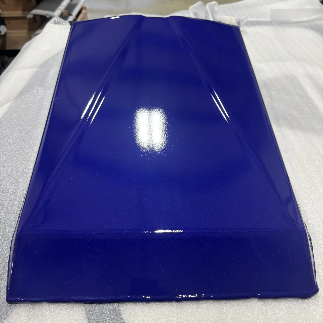 Blue powder-coated panel